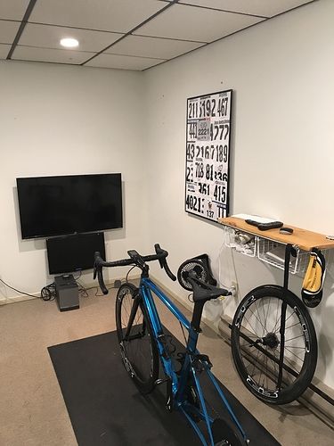 Let's see your paincave! - Equipment - TrainerRoad / Forum Pain Cave Cycling, Zwift Setup, Parisian Style Bedrooms, Cycling Room, Bike Cave, Zwift Cycling, Birmingham House, Gym Basement, Bicycle Room