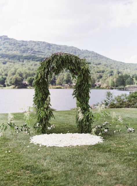 lush evergreen ceremony arch for a winter wedding Winter Wedding Arch, Ceremony Arch Decor, Winter Ceremony, Evergreen Wedding, Fall Wedding Arches, White Wedding Arch, Diy Wedding Arch, Rustic Winter Wedding, Wedding Arbour