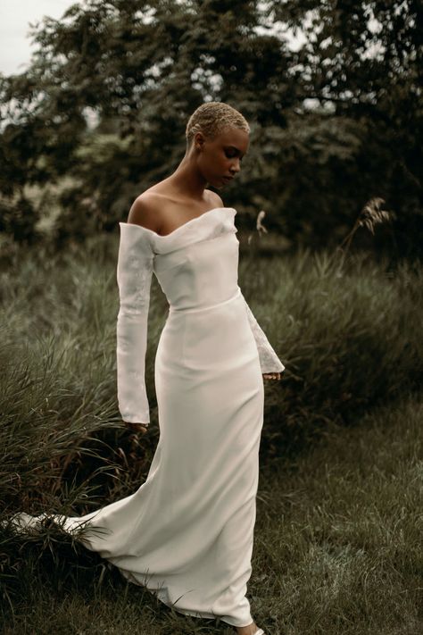 The Olsen Dress is an off-the-shoulder column dress with long sleeves. Made from silk crepe with a small train Minimalist Bride, Couture Wedding Gowns, Bridal Separates, Modern Bridal, Bridal Fashion Week, Modern Wedding Dress, Wedding Dress Shopping, Wedding Dresses Unique, Bridal Designs