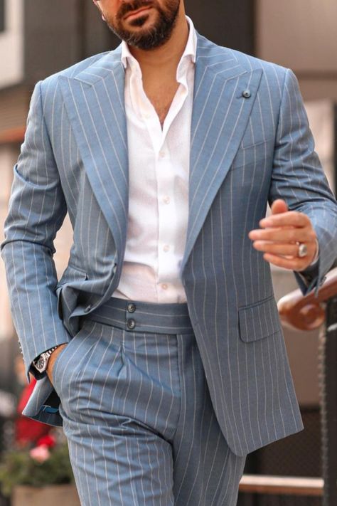 Man wearing a grey pinstripe suit! Mens Wide Peak Lapel Blazer, Sleek Suit Men, Tan Pinstripe Suit, Informal Suits For Men, Grey Striped Suit Men, Wide Lapel Suit Men, Casual Suits Men Modern Man, Stripe Suits For Men, Modern Suit Men