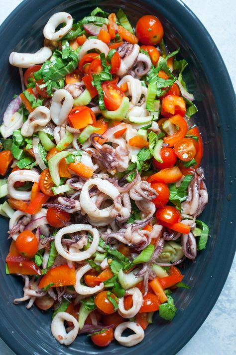 Calamari Salad: Loads of fresh vegetables tossed with quick-seared calamari makes for a delicious and light seafood salad. | macheesmo.com Cold Calamari Salad, Calamari Salad Recipes, International Salads, Calamari Salad, Seafood Salads, Antipasto Salad Recipe, Squid Salad, Grilled Salmon Salad, Seafood Dinners