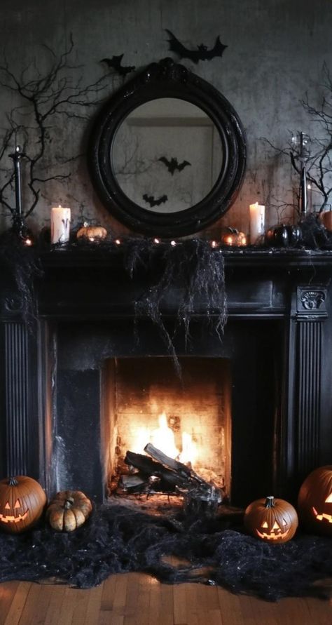 Transform your space with minimalist Halloween decor that embraces negative space and geometric shapes. Create a striking wall display using black paper cutouts of classic Halloween symbols like cats, bats, and crescent moons. Arrange slender black candlesticks of varying heights on a mantel, their clean lines casting dramatic shadows. Place a single, oversized white pumpkin in a corner for a bold focal point. These streamlined Halloween decorations demonstrate that a few well-chosen elements ca Black Fireplace Halloween Decor, Classy Halloween Decor Outdoor, Halloween Fireplace Decor, Minimalist Halloween Decor, Minimalist Decor Ideas, Sophisticated Halloween, Bat Display, Black Candlesticks, Halloween Fireplace