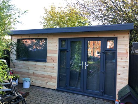 Almost complete, damp concrete garage given new life with 90mm kingspan cladding panels to walls and floor, kingspan roof sheets, spray painted second hand upvc window and doors, finished with 20mm redwood cladding Concrete Garage Conversion, Concrete Garage Makeover, Cladded Garage, Bifold Doors Extension, Garage Cladding, Hidden Garage, Shed Cladding, Small Garden Office, Concrete Sheds