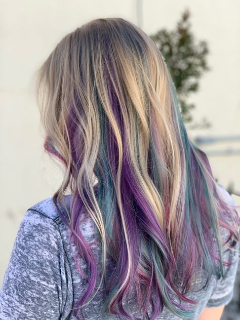 Curly Hair Hidden Color, Purple And Blue Streaks In Blonde Hair, Hair Fun Colors, Purple Bottom Hair, Blonde Hair With Purple And Blue Highlights, Purple And Teal Hair Highlights, Purple And Teal Highlights Blonde Hair, Blue Purple Pink Hair Peekaboo Highlights, Purple And Teal Hair Peekaboo