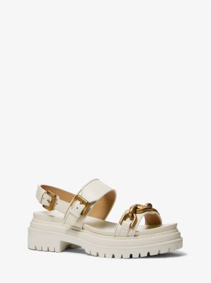 Kailey Logo Embellished Leather Sandal | Michael Kors Wide Straps Top, Floaty Dress, Lug Sole, Wide Straps, Men's Collection, Smooth Leather, Slip On Sandal, Leather Sandals, Designer Handbags