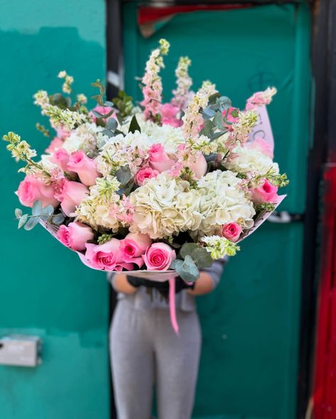 Large hand-tied bouquet featuring delphiniums, hydrangeas, roses. #florist #nyc #flowers #newyorkcity #newyork #delphinium #hydrangeas #roses Delphinium Bouquet, Nyc Flowers, Hand Tied Bouquet, Delphinium, Hydrangea, Florist, Roses, Flowers, Quick Saves