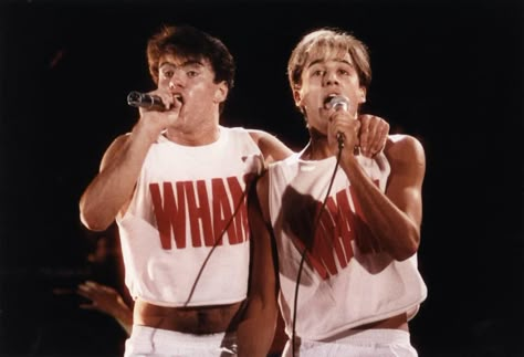 George and Andrew on stage in matching iconic t-shirts Wham 80s, 80s Singers, Goodnight Kisses, Roman Kemp, 80s Trends, 20th Century Music, Andrew Ridgeley, George Michael Wham, Vintage Crop Tops