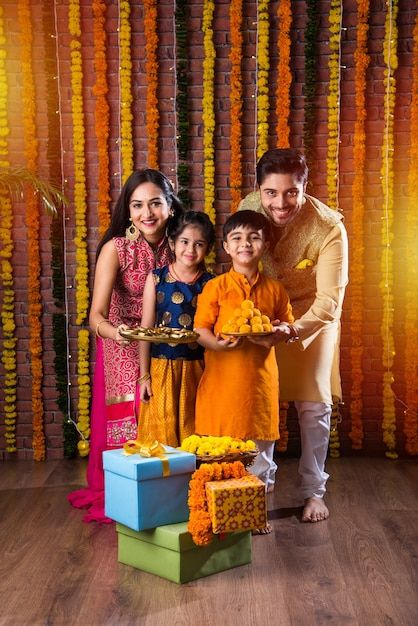 Diwali or rakshabandhan celebration - in... | Premium Photo #Freepik #photo #diwali-family #diwali-sweets #family-celebration #diwali-decoration Diwali Family Photoshoot Ideas, Diwali Family Photoshoot, Deepavali Photoshoot, Diwali Photo Hd, Diwali Shoot Ideas, Family Celebrating Diwali, Diwali Family, Diwali Pic, Festive Photoshoot