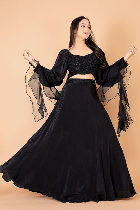 Item Details:- Handmade Description:-Introducing the epitome of contemporary elegance: our Trendy Black Lehenga Choli. The star of the ensemble is the heavy embroidered blouse. Paired with a sleek black lehenga skirt, this combination offers a timeless allure that never fails to captivate. Completing the look is a luxurious ruffle dupatta, adding a touch of drama and flair to the ensemble. Specifications:- Blouse Fabric:-Silk  Blouse Colour:-Black Blouse Work:- Beads and Sequins monotone hand em Black Blouse For Lehenga, Black Chaniya Choli Wedding, Black Ghagra Choli, Black Blouse Designs For Lehenga, Black Ghagra, Designer Chaniya Choli, Indo Western Outfits For Women, Lengha Blouse, Choli For Wedding