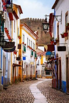 Obidos Portugal Obidos Portugal | photographer inspiration | photographer idea | film photography ideas | #Photography #Photographers Obidos Portugal, Colorful Buildings, Visit Portugal, Portugal Travel, Medieval Town, Spain And Portugal, Algarve, Places Around The World, Travel Around The World