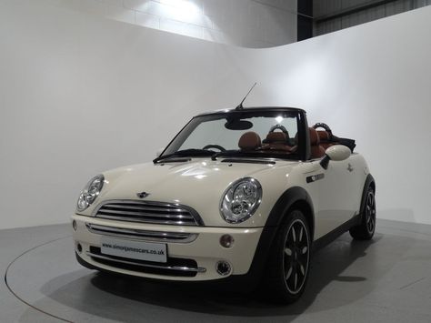 MINI Cooper Sidewalk 1.6 Convertible Finished in Pepper White with Malt Brown English Leather Interior. For more spec and images: http://www.simonjamescars.co.uk/mini-convertible-cooper-sidewalk-in-chesterfield-south-yorkshire-3432396 White Mini Cooper Convertible, Mini Cooper Aesthetic White, Cream Mini Cooper Aesthetic, Brown Mini Cooper, Cream Mini Cooper, Aesthetic Mini Cooper, Cute Mini Cooper, Mini Cooper Aesthetic, White Mini Cooper