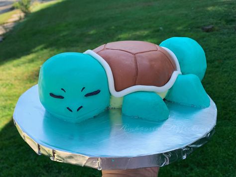 For my child’s birthday we did a pokemon theme. I of course thrned her favorite pokemon, Squirtle, into cake. Chocolate cake with vanilla frosting covered in modeling chocolate. Squirtle Cake, Pokemon Birthday Party Cake, Chocolate Cake With Vanilla Frosting, Cake Pokemon, Pokemon Birthday Cake, 9th Birthday Cake, Birthday Cake Cake, Pokemon Cake, Cookie Cakes