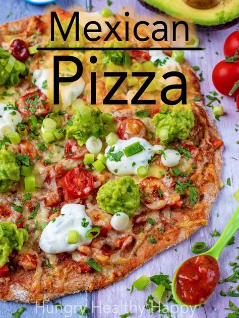 Mexican Pizza is a fusion of two of the best cuisines in the world. A crisp pizza base smothered in hot and smokey chunky salsa and then scattered with some tomatoes and cheese. Topped off with mashed avocado, sour cream and some onion and herbs. Is your mouth watering yet?  #mexicanfood #italianfood #fusionfood #pizza #pizzarecipe #avocado via @hhhdannii Pizza With Avocado, Avocado Sour Cream, Avocado Pizza, Mexican Pizza Recipe, Tomatoes And Cheese, Mexican Pasta, Mexican Treats, Pizza Base, Healthy Burger