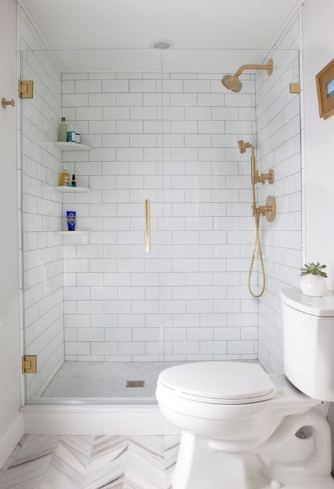 Gold Shower Head white subway tile bathroom herringbone tile floor Small Bathroom Solutions, Master Suite Addition, Makeover Kamar Mandi, Bilik Air, Small Bathroom With Shower, Decor Baie, Bathroom Solutions, Floating Vanity, Bathroom Redo