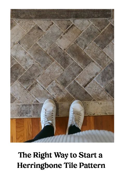 White sneakers standing on a herringbone tile pattern with text "The Right Way to Start a Herringbone Tile Pattern". Herringbone Kitchen Floor, Herringbone Fireplace Tile, Brick Herringbone Floor, Herringbone Tile Floor, Herringbone Fireplace, Herringbone Brick Floor, Herringbone Tile Pattern, Bathroom Tile Diy, Painting Bathroom Tiles