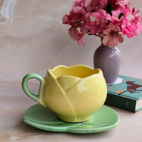 Introducing Yellow Tulip Cup & Saucer . . #tulip #colorpop #art #decor #design #pottery #ceramiccup #ceramiccupandsaucer #warm#spring#flowers #blooming #ceramiclife #ceramicinspiration #ceramicdesign #ceramicsofinstagram #ceramictableware #ceramicglaze #ceramiclovers #cutecups #pininterest #yellowflowers #yellow #green #coffeemugs #teamugs #loveforhandmade #ceramiclife #loveforart #supportsmallbusiness Tulip Cup, Ceramic Projects, Ceramics Art, Flowers Blooming, Yellow Tulips, Ceramics Projects, Warm Spring, Ceramic Tableware, Cute Cups