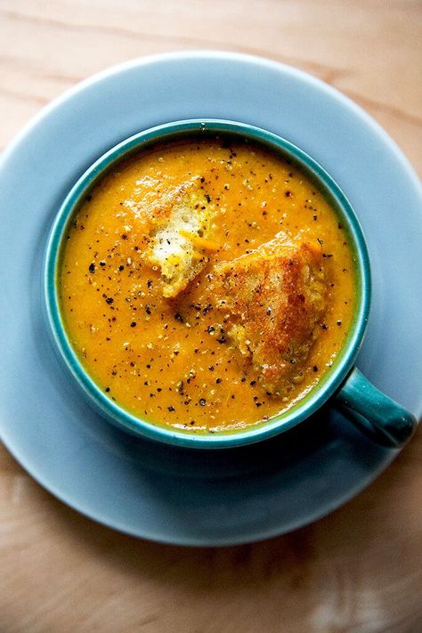 Carrot-ginger soup with curry and coconut milk — heaven! Inspired by a soup served at The Placid Baker in Troy, this recipe calls for roasting carrots while celery, onion, and ginger sweat on the stovetop. A few spices + coconut milk finishes it off. This happens to be vegan to boot. #soup #carrotginger #winter #csa #comfortfood #vegan #veganrecipes Roasting Carrots, Soup With Curry, Coconut Milk Soup, Carrot Ginger Soup, Ginger Soup, Coconut Milk Curry, Keto Pancakes, Vegan Curry, Carrot And Ginger