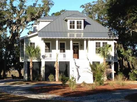 The St. Helena - AllisonRamseyArchitects House On Stilts With Wrap Around Porch, Farmhouse On Stilts, River House Plans, Elevated House Plans, Stilt Home, Stilt Houses, Waterfront House, Elevated House, Coastal Exterior