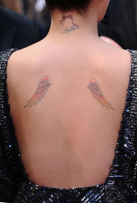 Pin for Later: The Ultimate Celebrity Tattoo Gallery Nicole Richie Nicole Richie Tattoo, Tattoo Lower Back, Wing Tattoos On Back, Angel Wings Tattoo, Wing Tattoo, Red Ink Tattoos, Tattoos Skull, Detailed Tattoo