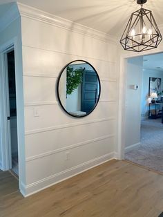 Horizontal Board And Batten, Painting Trim White, Batten Wall, Hallway Light Fixtures, Board And Batten Wall, Entryway Lighting, Lake House Plans, Wall Trim, Painting Trim