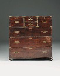 A hardwood and brass bound campaign chest, early 19th century British Campaign Furniture, Campaign Chest, British Colonial Decor, Campaign Furniture, Vintage Boxes Wooden, Colonial Decor, Antique Cabinets, Wood Storage, New Room