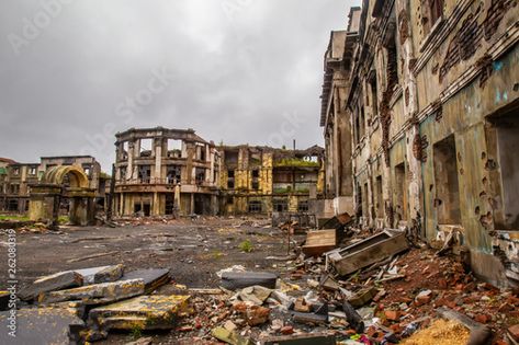 Stock Image: The city ruins after the war. Ruins of war. Broken city after the military bombing. The bombed-out buildings. The wreckage of buildings. War destruction. Apocalyptic City, City Ruins, Post Apocalyptic City, City Images, Broken City, Post Apocalyptic, The Military, Book Inspiration, Film Photography