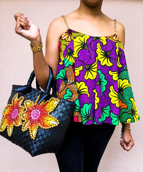 Enjoy african fashion with Mapapa’s Golden chains tank top in african prints. Accessorized with an Embellished basket. shop them now on www.mapapas.com #TankTop #Fashion #Fashionable #Wax #AfricanPrints #Ankara #AfricanFabrics #Prints #Handmade #AfricanFashion #Accessories Chitenge Tops, Womens Printed Tops, African Tops, African Print Tops, Beach Tanks Tops, Afrikaanse Mode, African Fashion Modern, Relaxed Outfit, Ladies Top