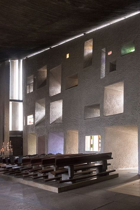 Inside the chapel of Notre Dame du Haut - Ronchamp, France - a chapel by Le Corbusier and a UNESCO World Heritage site - www.RoadTripsaroundtheWorld.com Le Corbusier Ronchamp, Le Corbusier Notre Dame Du Haut, Ronchamp Chapel, Le Corbusier Interior, Corbusier Interior, Ronchamp Le Corbusier, Corbusier Architecture, Le Corbusier Architecture, Church Building Design