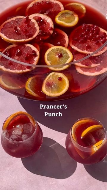 Hi I’m Steph but my friends call me Bev on Instagram: "Day 16 of 25 Holiday Bevs! Prancer’s Punch 🎄✨ 1/3 cup maple syrup 1 1/2 cups grapefruit juice 2 cups pomegranate juice 1/2 cup orange liqueur 2 cups tequila 2 sliced oranges 2 sliced grapefruits 1/2 cup pomegranate arils . . . . . #cocktailrecipe #dinnerparty #drink #alcoholicbeverages #drinksathome #easyrecipes #bartender #cocktails #mixology #easyrecipes #tequilacocktails #homemadecocktails #holidaycocktails #holidayrecipes #c Prancers Punch, Red Sleigh Sparkler Punch, Pomegranate Tequila, Tequila Punch, Sliced Oranges, Chill Drinks, Orange Liqueur, Holiday Punch, Homemade Cocktails