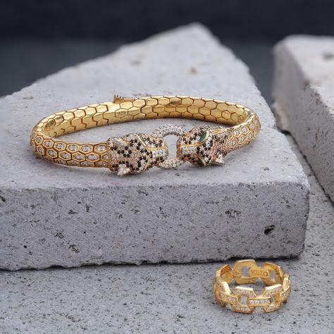 Captivating design meets classic elegance. The Gold Panther Bracelet paired with an 18K Gold Chain Band Ring and White CZ Diamonds offers unmatched quality and timeless beauty. Panther Bracelet, 18k Gold Chain, Cz Diamond, The Gold, Classic Elegance, Band Ring, Python, Timeless Beauty, Gold Chain