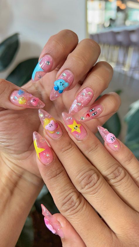 Gelx medium stiletto nails #kirby #gelxapres #stilettonail #pink Kirby Themed Nails, Amusement Park Nails, Kirby Nail Design, Rosalina Nails, Princess Peach Nail Art, Kirby Nails Acrylic, My Little Pony Theme Nails, Pikmin Nails, Quilt Nails Designs