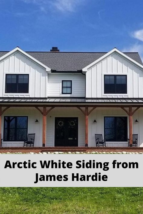 White siding with black windows is a perfect exterior design combination for a farmhouse. Seen here is Arctic White siding in a board and batten style. Gray And White Farmhouse Exterior, White Vertical Siding Exterior Black Windows, White Hardy Board Siding, Black And White Board And Batten Exterior, Board And Batten Front Of House, James Hardie Artic White Siding, Black Windows On White House, James Hardie Board And Batten Siding, White Siding Exterior Color Schemes