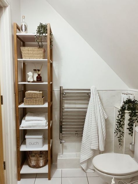 11 Apartment Bathroom Ideas That Will Spruce It Up – May the Ray Bamboo Bathroom Aesthetic, Bathrooms With Bamboo Accessories, Bathroom Shelving Unit Ideas, Organized Bathroom Shelves, Bathroom Ideas Bamboo, White And Bamboo Bathroom, Bamboo House Decor, Neutral Bathroom Decor Ideas Earth Tones, Neutral Bathroom Aesthetic