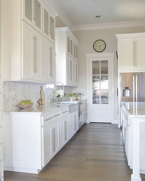 Gorgeous white kitchen with white carrara marble and white cabinets http://www.zdesignathome.com Galley Kitchen Remodel Ideas, Gorgeous White Kitchen, Galley Kitchen Design, Galley Kitchen Remodel, Small Condo, Galley Kitchens, Kitchen Cabinet Remodel, Kitchen Cabinets Makeover, White Kitchen Design