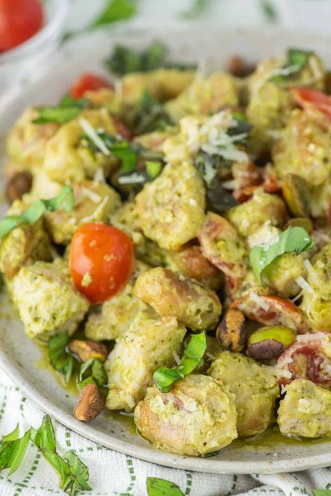 This chicken pesto gnocchi recipe uses store-bought gnocchi, chicken, pesto, goat cheese and tomatoes, making for a tasty and quick dinner. #chickenpestognocchi #gnocchi #gnocchirecipe | chiselandfork.com Chicken Pesto Gnocchi Recipe, Gnocchi Chicken, Gnocchi Pesto, Pesto Gnocchi, Gnocchi Dishes, Pasta Cheese, How To Cook Gnocchi, Gnocchi Recipe, Chicken Gnocchi