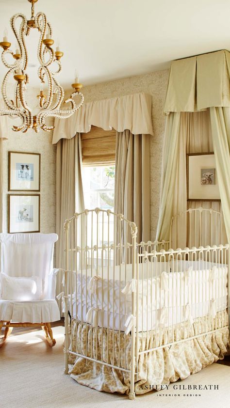 ASHLEY GILBREATH INTERIOR DESIGN: A dreamy neutral nursery in a Southern designer's personal home. A beautiful iron bed with custom bed skirt and bed crown surrounded by soft textures and vintage framed prints. French Nursery Decor, Ashley Gilbreath Interiors, Ashley Gilbreath, Iron Crib, White Baby Cribs, French Nursery, Elegant Nursery, Canopy Bedroom, Rocking Chair Nursery