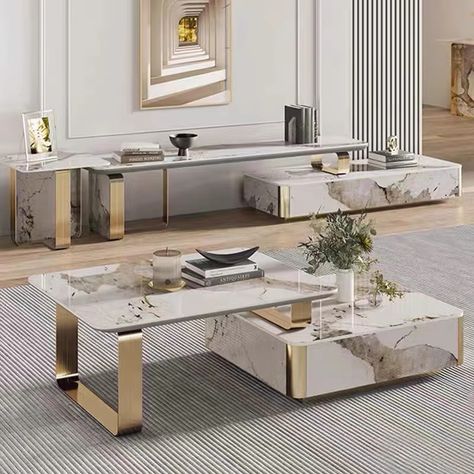 1 Main color tone: Use neutral colors (such as beige, gray, white) as the main color, with gold, black, or dark tones as accents.
2.Color scheme: You can choose some warm tones, such as light wood or dark blue, to add a sense of layering.
two
3.Coffee table: A coffee table made of marble or metal material can be selected, with a simple and stylish design.
4.Storage cabinet: Choose modern storage cabinets with delicate craftsmanship, paired with metal or mirror elements. Luxury Tv Cabinet, Square Wood Table, Coffee Table Luxury, Industrial Office Decor, Home Decor Catalogs, Minimalist Coffee Table, Living Room Table Sets, Luxury Coffee Table, Coffee Table Grey