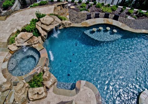 Get that resort style living with a pool and raised spa, waterfall, swimup bar and sun shelf! http://www.anthonysylvan.com/browse-pools-spas/pool-designs/free-form-pools/ Pool With Hot Tub And Sun Shelf, Swimup Bar, Pool With Swim Up Bar, Anthony Sylvan Pools, House Pool Party, Spa Waterfall, Custom Inground Pools, Sun Shelf, Paradise Pools