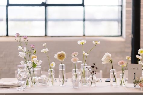 Simple elegant bud vases for head table by Thicket Creative Floral Design Bud Vase Table Arrangements, Single Stem Flower Table Decor, Bud Vase Spring Flowers, Table Setting Bud Vases, Tiny Vases With Flowers Centerpieces, Small Flower Vases Wedding Table, Bud Vase Aisle Decor, Round Wedding Table Bud Vases, Single Stem Vases Wedding