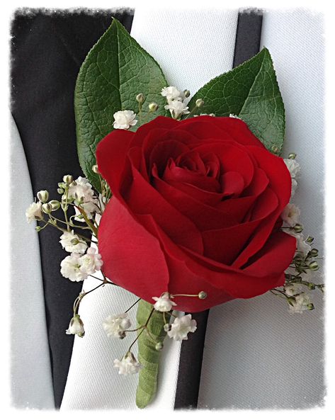 Red rose and baby's breath with a bit of greenery for guys Boutonnieres idea Bridal Bouquet With Red Roses, Red Rose Boutonniere Prom, Rose Boutineer Ideas, Pink And Red Boutonniere, Red Rose Boutineer, Red Boutonniere Wedding, Red Rose Prom Bouquet, Red Rose Buttonhole, Red Rose Boutonniere Wedding