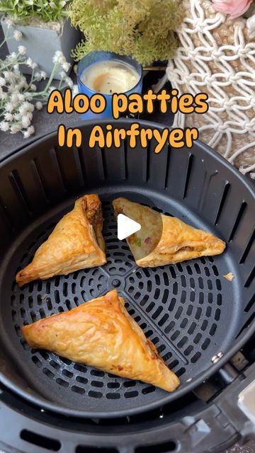 Pragya saini on Instagram: "Airfryer Adventures Episode 12: Aloo Patties Tag a friend who owns an airfryer!  Recipe: 1 tbsp ghee 1/4 cup matar Grated ginger (optional) 1 1/2 tsp kashmiri red chilli powder  1/2 tsp black pepper  2 tsp dhaniya powder  1 tap jeera powder  1/2 tap haldi  1 tsp chaat masala/amchur powder 1 tsp salt  3 boiled potatoes  Add 2 green chillies and chopped coriander in the end. Add the filling in puff pastry sheets. Fold and secure the sheets  Brush some milk on  the patties. Airfry for 20 minutes at 150 degrees and serve hot with ketchup. #patties #relatable #recipe #easyrecipes #airfryer #cooking #nostalgia #childhood #memories #eat #reelsinstagram #reelitfeelit #trending #explore #tag" Aloo Patties Recipe, Airfryer Indian Recipes, Airfryer Recipes Indian, Aloo Patties, Amchur Powder, Airfryer Recipe, Nostalgia Childhood, Red Chilli Powder, Patties Recipe