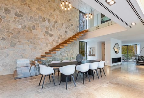 Indoor Stone Wall, Stone Wall Ideas, Stone Wall Interior Design, Decorative Stone Wall, Dark Wood Dining Table, Stone Feature Wall, Stone Walls Interior, Stone Wall Design, Stone Wall Cladding