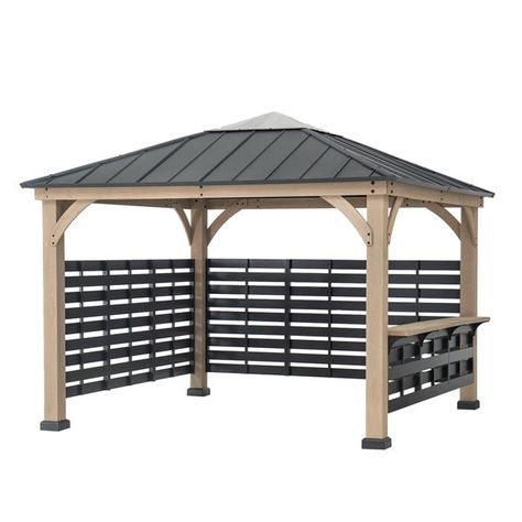 Treat yourself to comfort and convenience with this easy-to-assemble gazebo and spend all 4 seasons enjoying a covered spot outdoors. The skylight will provide needed shade on hot sunny days while allowing in natural light. Customize your gazebo with the privacy screens and the large serving shelf to fit your needs, with 3 available configurations. You'll be relaxing in your favourite new outdoor living space for years to come!Premium cedar wood frameDurable matte black rust-resistant powder-coa Permanent Gazebo, Polycarbonate Roof, Steel Gazebo, Hot Tub Patio, Hot Tub Gazebo, Grill Gazebo, Hot Tub Backyard, Wood Frame Construction, Privacy Walls