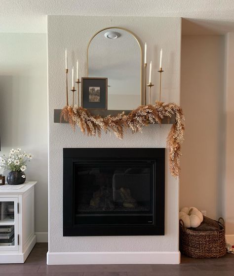 Simple start to my fall mantle 🍂🤎 #homedecor #targetstyle #fallsale #neutralhome #mytargetstyle #ltkhome #california #fallvibes #falldecor #september #happyseptember #transitionalhome #organicmodern #livingroom #studiomcgee Arch Mirror Mantle, Mirror On Mantle, Above Mantel Decor, Tv Mantle Decor, Fall Mantle Decor With Tv, Small Mantle Decor, Mirror Mantle, Tv Mantle, Candlestick Arrangements