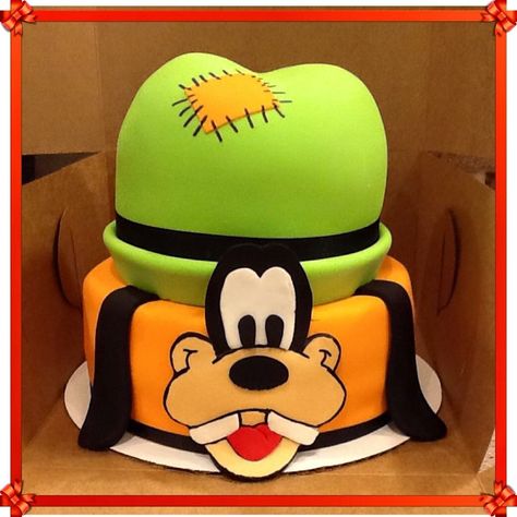 Disney’s goofy cake Goofy Cake Disney, Goofy Themed Birthday Party, Goofy Birthday Cake, Goofy Cake Ideas, Goofy Birthday Party, Goofy Birthday, Goofy Cake, Disney Characters Christmas, 2nd Birthday Party For Boys