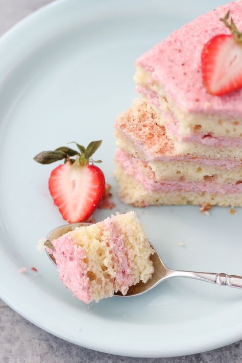 This Strawberry Mousse Cake is a showstopper. The fluffy sponge cake layers are brushed with a strawberry liqueur syrup and laced with a creamy and luscious strawberry mousse frosting in between the cake layers. Fluffy Strawberry Cake, Strawberry Mouse Cake, Strawberry Gateau Cake, Strawberry Mousse Filling For Cake, Strawberry Mouse Cake Recipe, Strawberry Mousse Cake Filling, Strawberry Mouse Cake Filling, Strawberry Mousseline Cake, Strawberry Mousse Recipe Cake Fillings