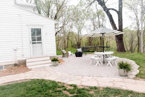 Learn how to build a pea gravel patio that is not only beautiful, but also an inexpensive way to enjoy your yard all season long. #farmhouseonboone #DIYpatio #peagravelpatio Gravel Patio Ideas, Basement Patio, Pea Stone, Farmhouse On Boone, Patio Farmhouse, Pea Gravel Patio, French Patio, Gravel Stones, Faux Fireplace Diy