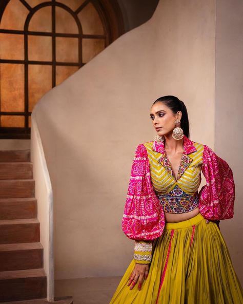 A fun silhouette with the gorgeous bishop sleeve and collar detailing along with this beautiful pink and yellow colour is here to make you stand out💗💛 @rups_boutique #NavratriOutfit #ChaniyaCholiLove #NavratriVibes #GarbaOutfitInspo #ChaniyaCholiStyle #FestiveFashion #NavratriCelebrate #ChaniyaCholiGoals #નવરાત્રીઆઉટફિટ Lengha Blouse Designs, Saree Jacket Designs, Garba Outfit, Indian Dresses For Women, Cotton Blouse Design, Lehenga Saree Design, Navratri Dress, Trendy Outfits Indian, New Saree Blouse Designs