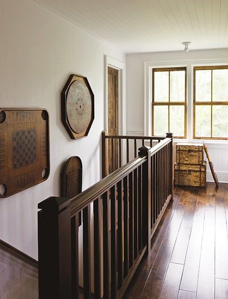 house-home-traditional-cottage-stair-landing Cottages House, Crokinole Board, Cottage Stairs, Staircase Landing, Open Staircase, Wood Staircase, Traditional Cottage, Storage Idea, Attic Remodel