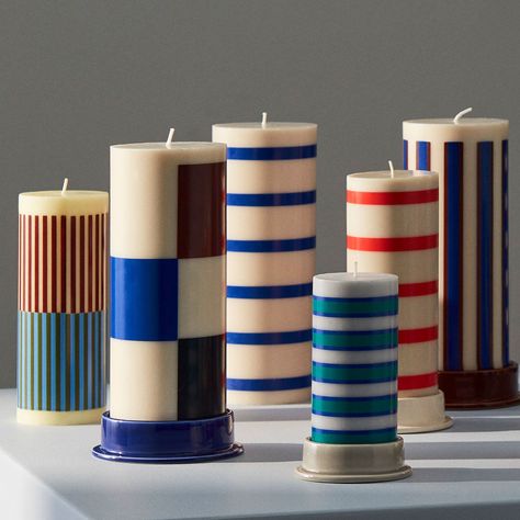 Crafted in earthenware with a semi-transparent glaze, the Column Candleholder by HAY is a low tubular design with a tempting colour palette. Designed to be used with HAY Column Candles, the minimalistic candleholder features a circular base that balances the design and catches any dripping wax. Available in different widths and colours, the candleholders can be used individually or grouped together in contrasting designs. Hay Candle, Colourful Candles, Flat Inspiration, Striped Candles, Pinterest Room, Cylinder Candles, Kids Room Lighting, Hay Design, Eye Gift